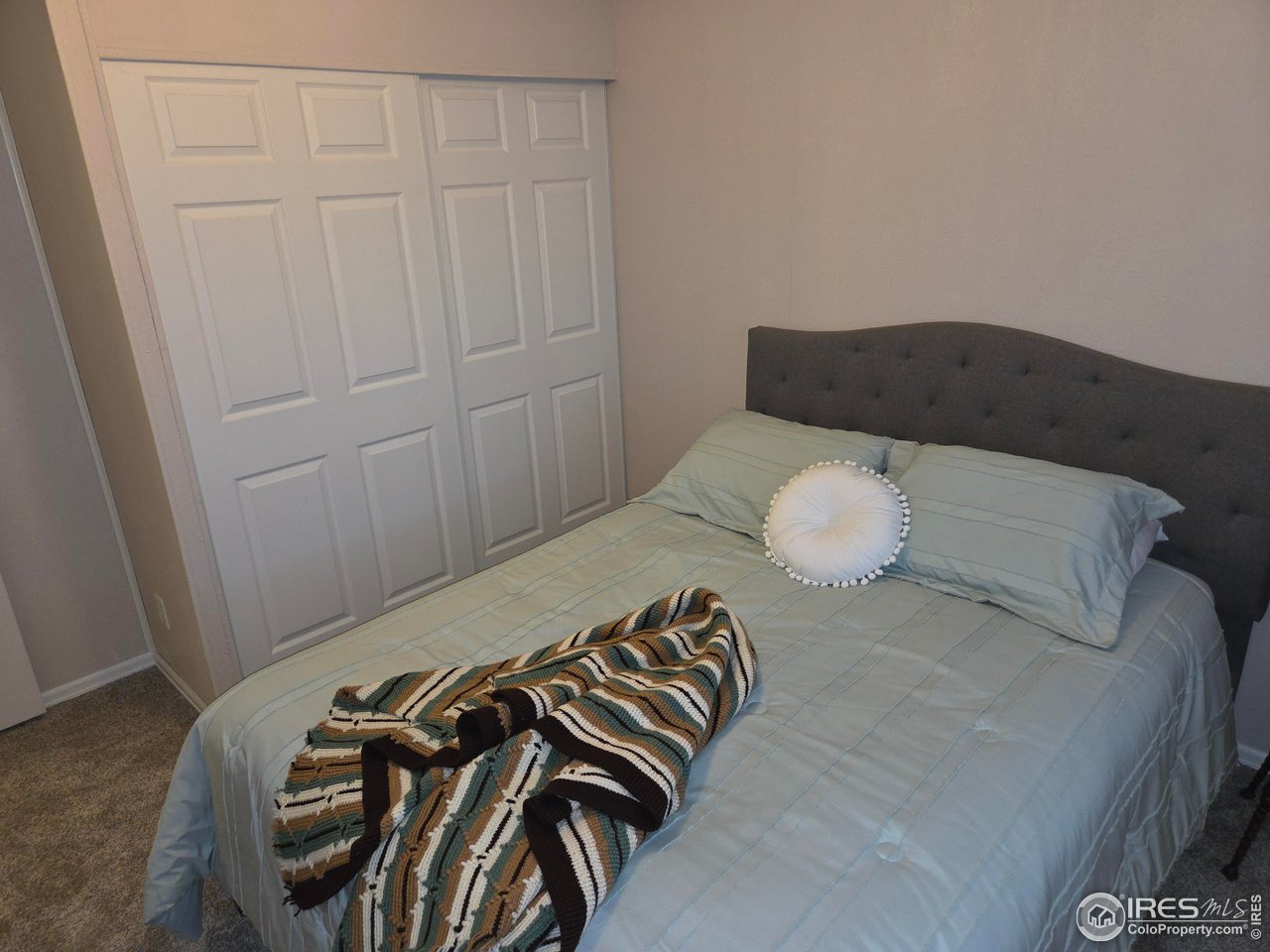 15296 County Road 39 Sterling, CO 80751 - Photo 25 of 26 a view of a bedroom with furniture