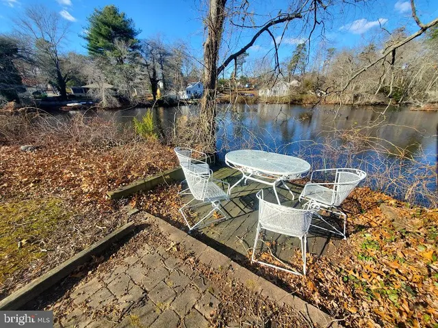 a view of a balcony with chairs