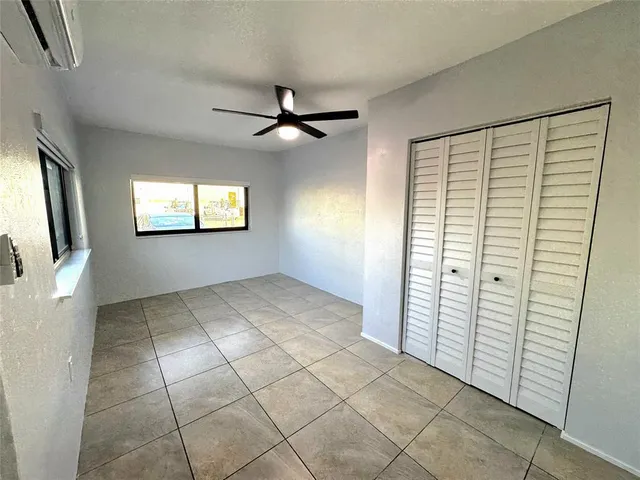a view of an empty room and window