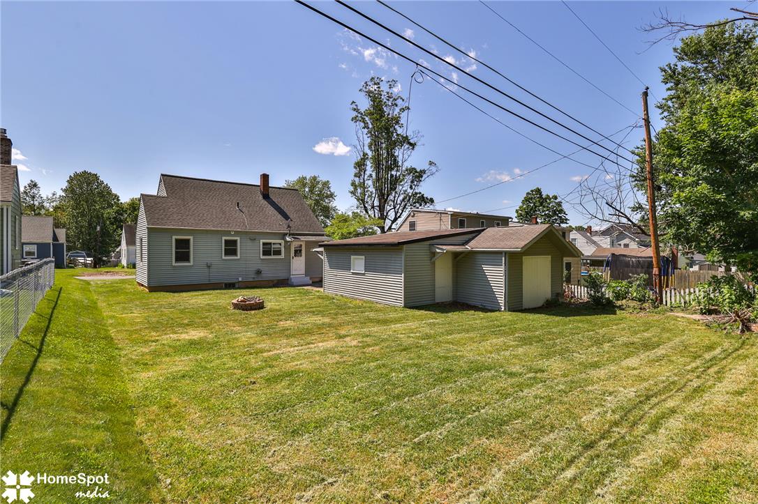 415 Willow Road Hellertown, PA 18055 - Photo 7 of 25 A generous backyard offers ample space for outdoor activities and future enhancements.