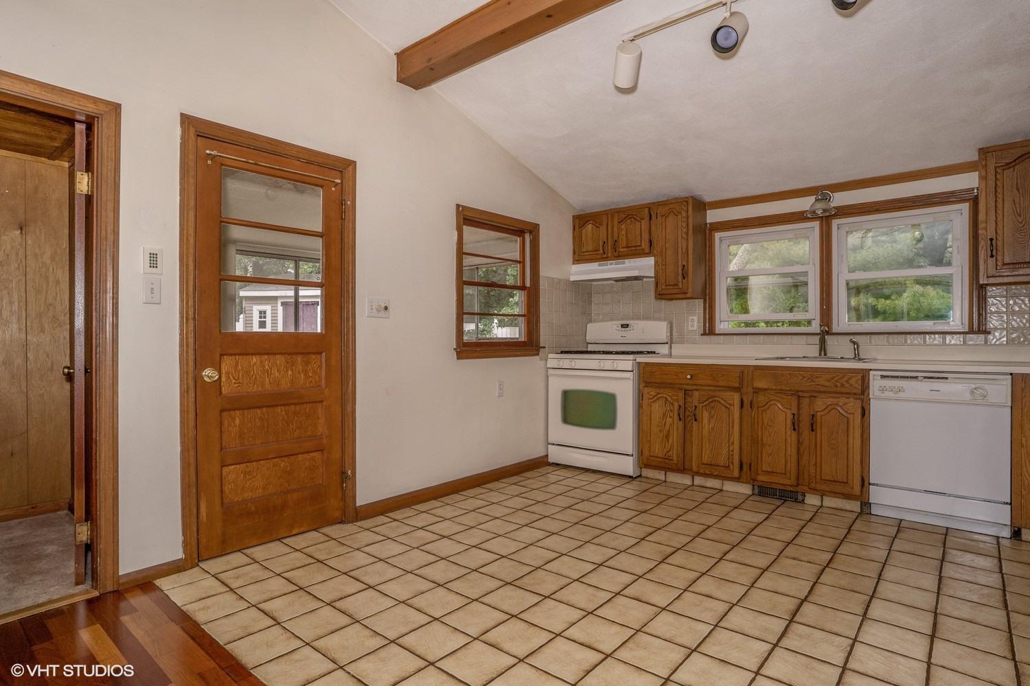 8 Boysenberry Road East Wareham, MA 02538 - Photo 4 of 15 a kitchen with stainless steel appliances a sink and cabinets