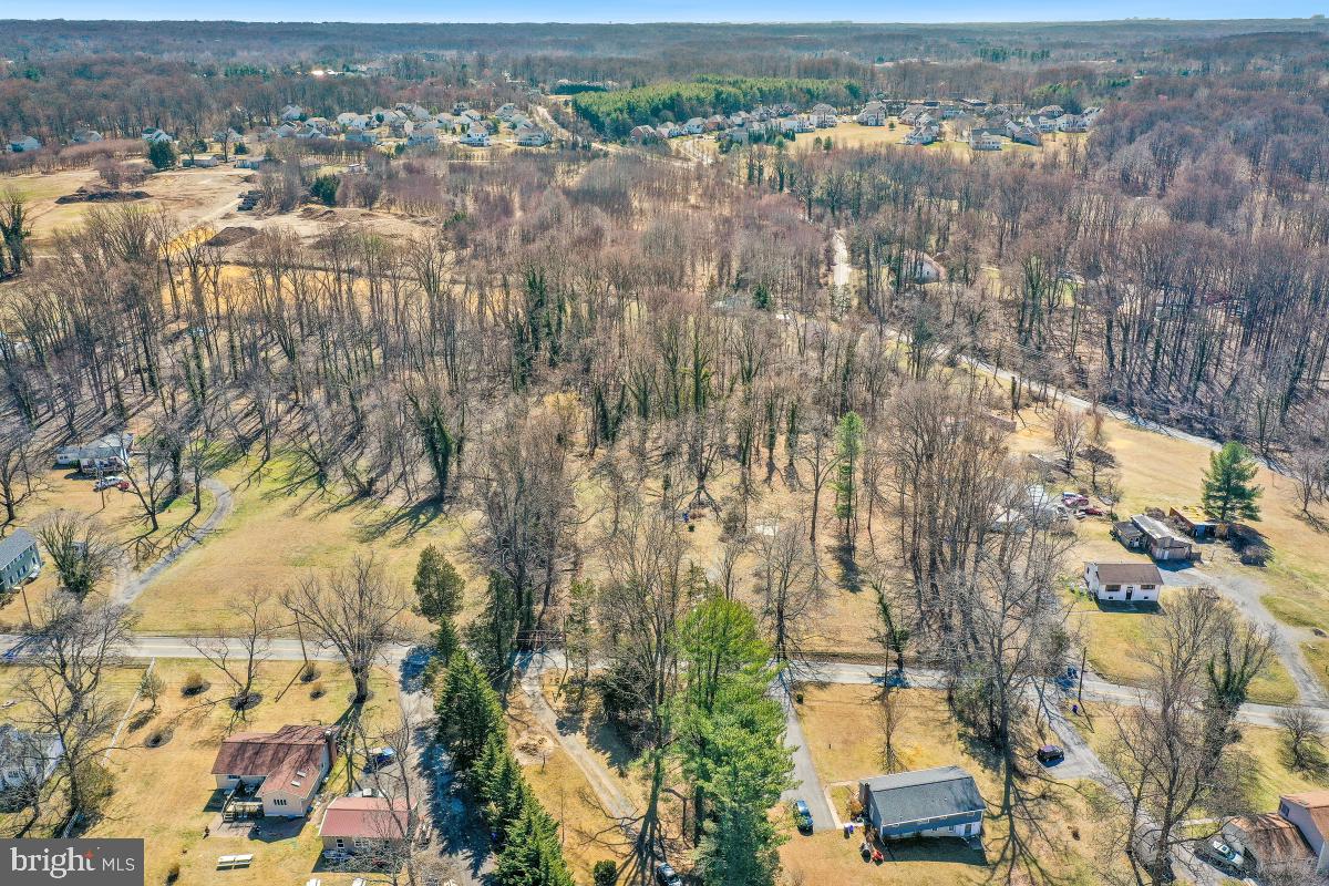 18465 Brooke Road Sandy Spring, MD 20860 - Photo 18 of 24 an aerial view of residential houses with outdoor space