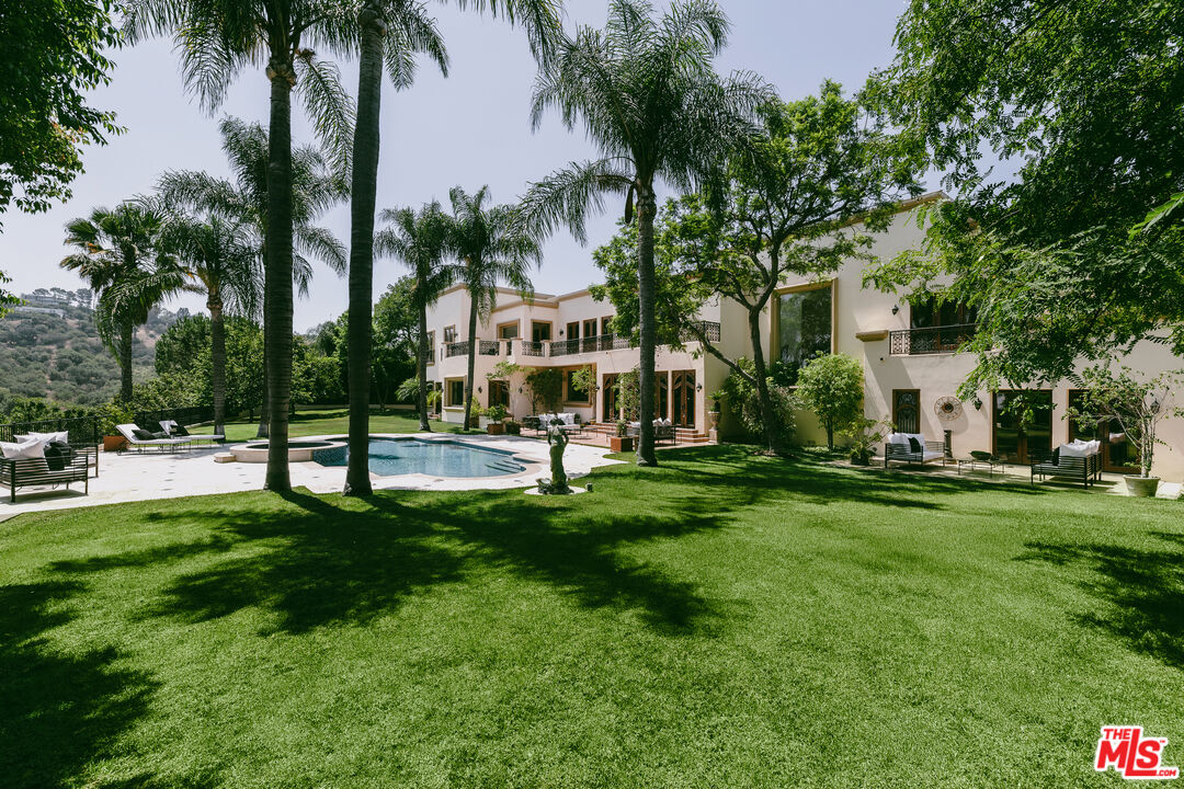 3364 Clerendon Road Beverly Hills, CA 90210 - Photo 2 of 33 a view of a park with palm trees
