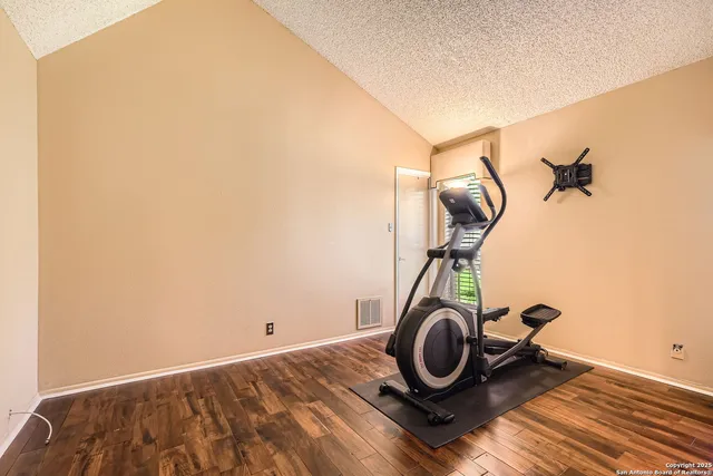 a view of a room with gym equipment