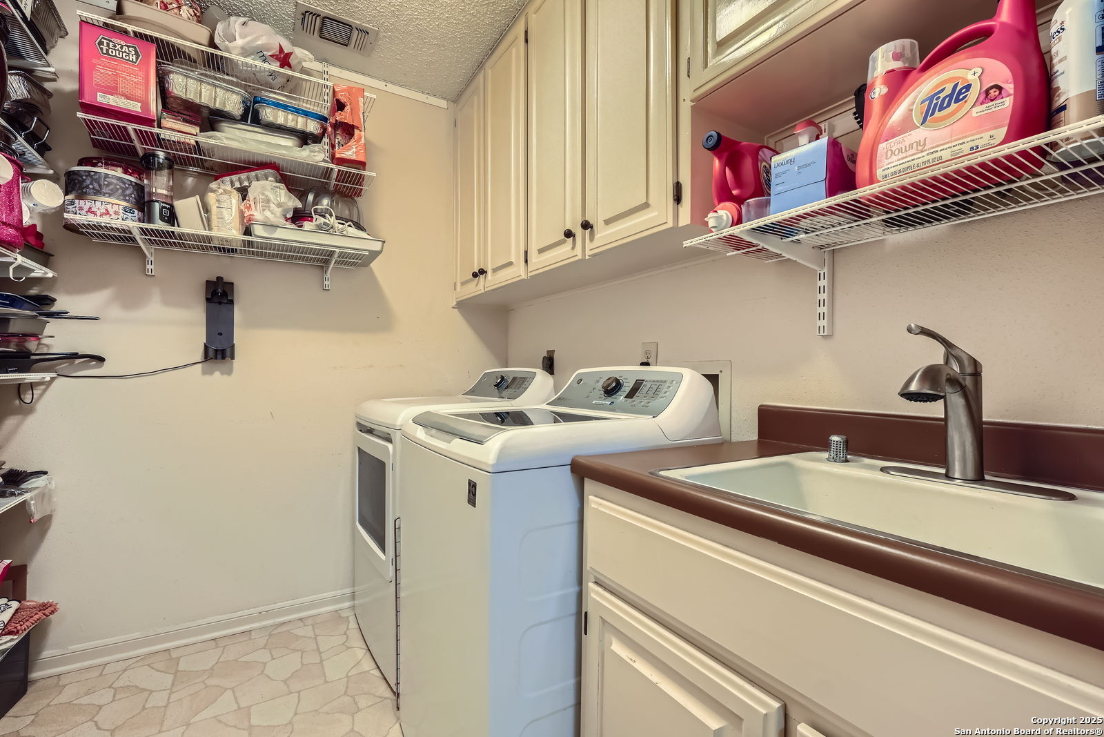 13215 Hunters Spring San Antonio, TX 78230 - Photo 23 of 29 a utility room with dryer and washer