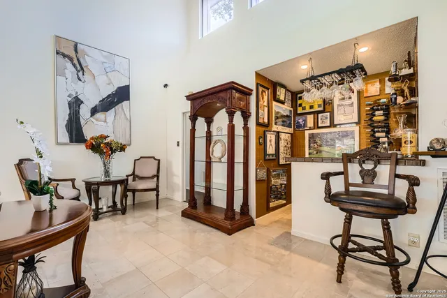 a view of a livingroom with furniture and hardwood floor