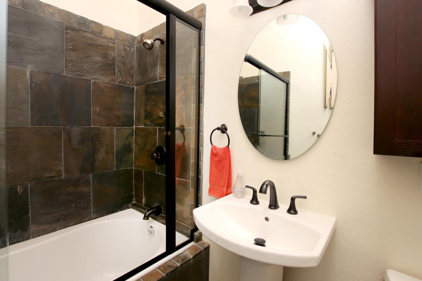 27 Erba Lane Scotts Valley, CA 95066 - Photo 18 of 30 a bathroom with a sink a toilet and shower