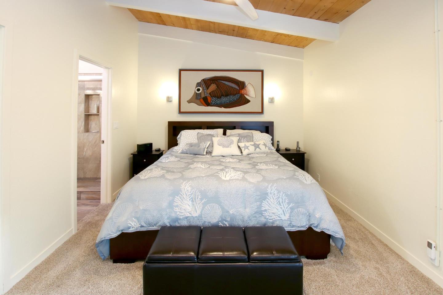 27 Erba Lane Scotts Valley, CA 95066 - Photo 22 of 30 a bed sitting in a bedroom next to a window with a mirror