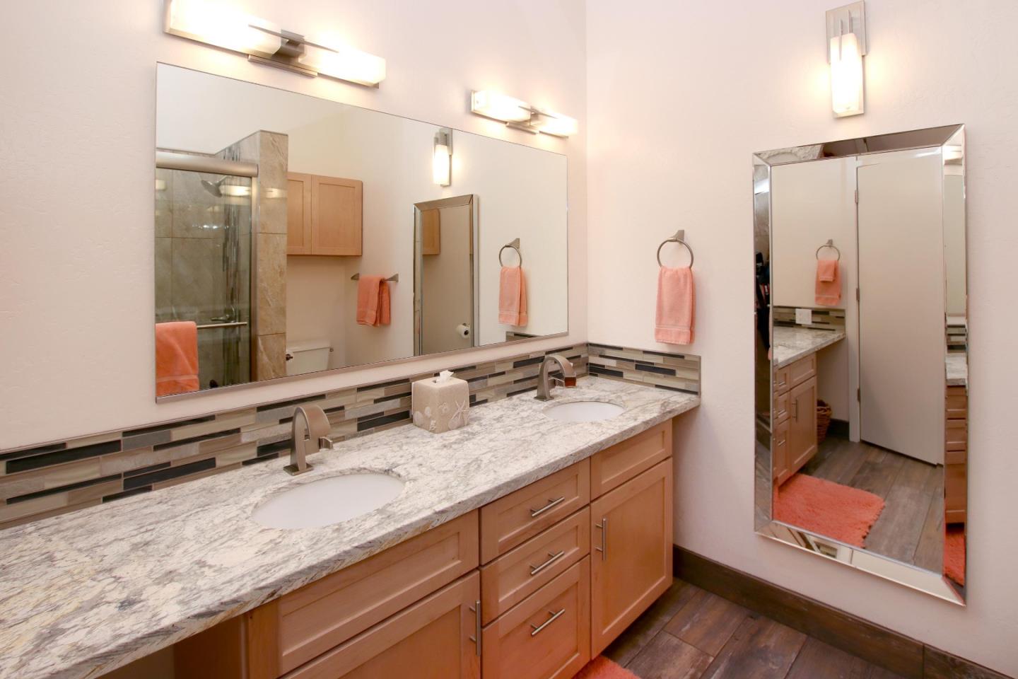 27 Erba Lane Scotts Valley, CA 95066 - Photo 23 of 30 a bathroom with a granite countertop sink mirror and double