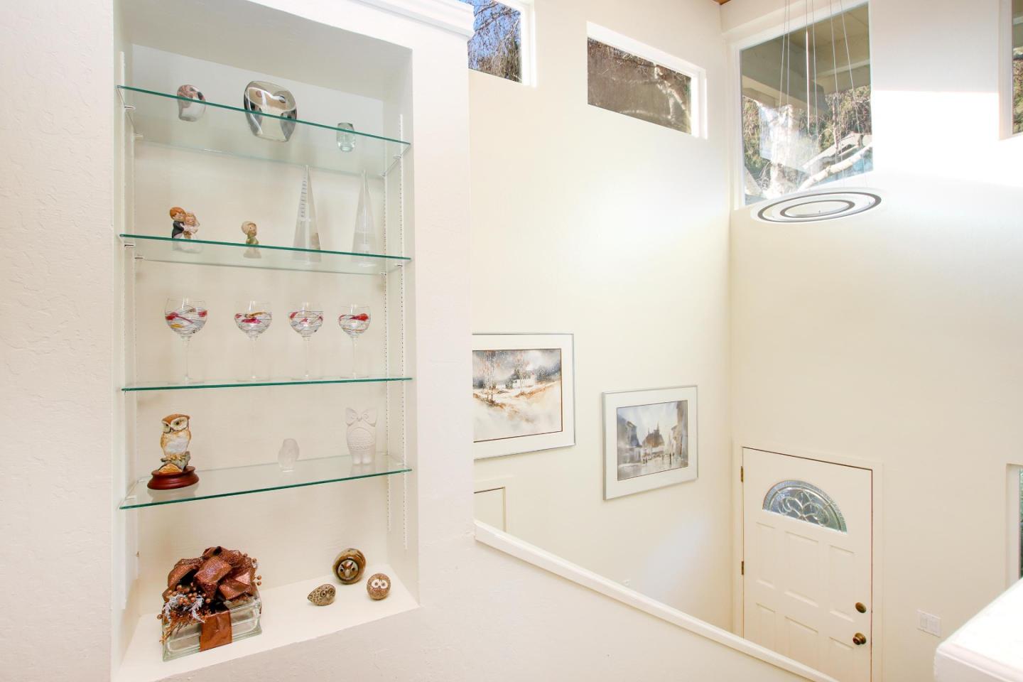 27 Erba Lane Scotts Valley, CA 95066 - Photo 5 of 30 a view of a hallway with white cabinets