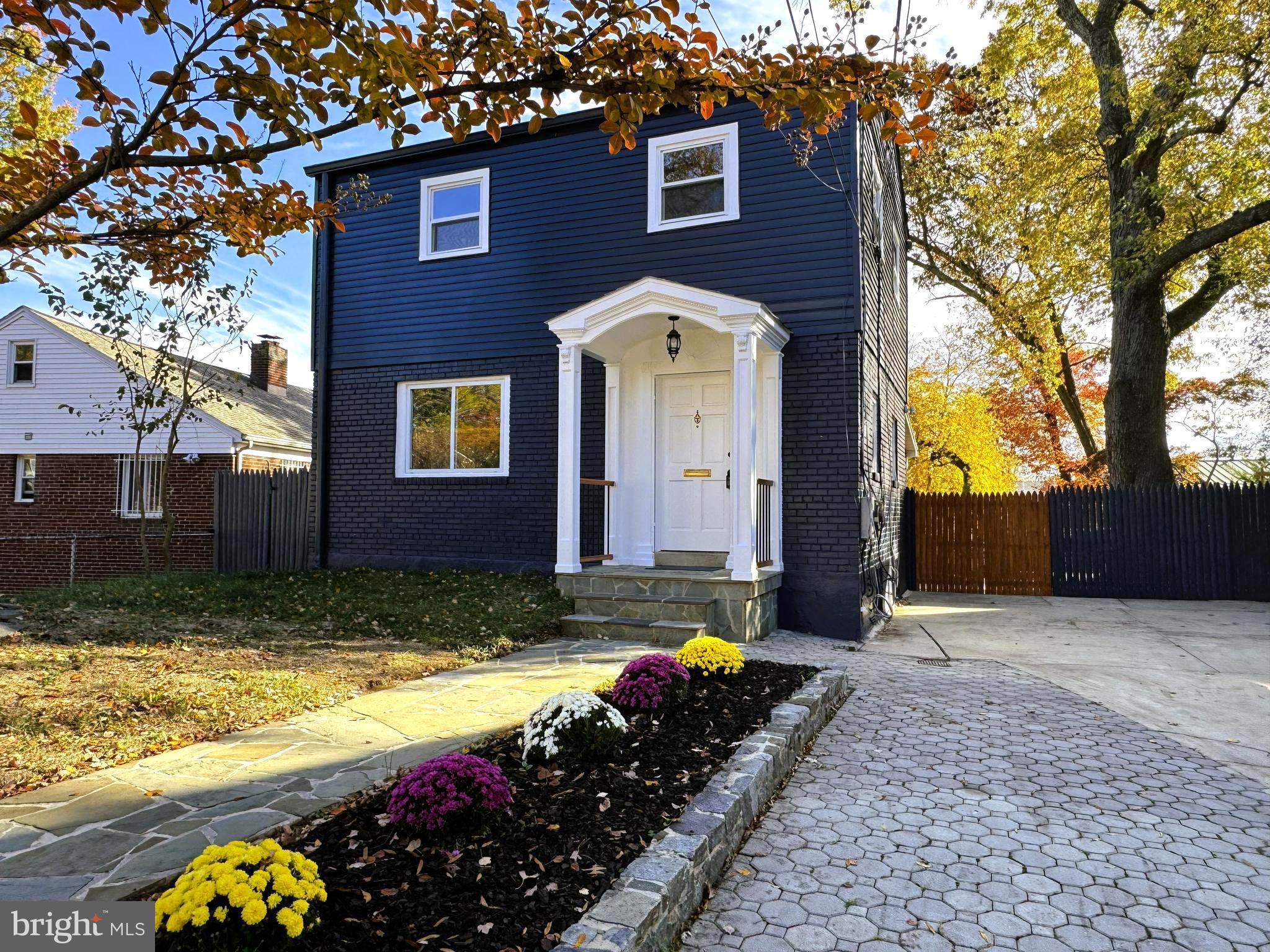 717 Ludlow Street Takoma Park, MD 20912 - Photo 2 of 68 a front view of a house with a yard