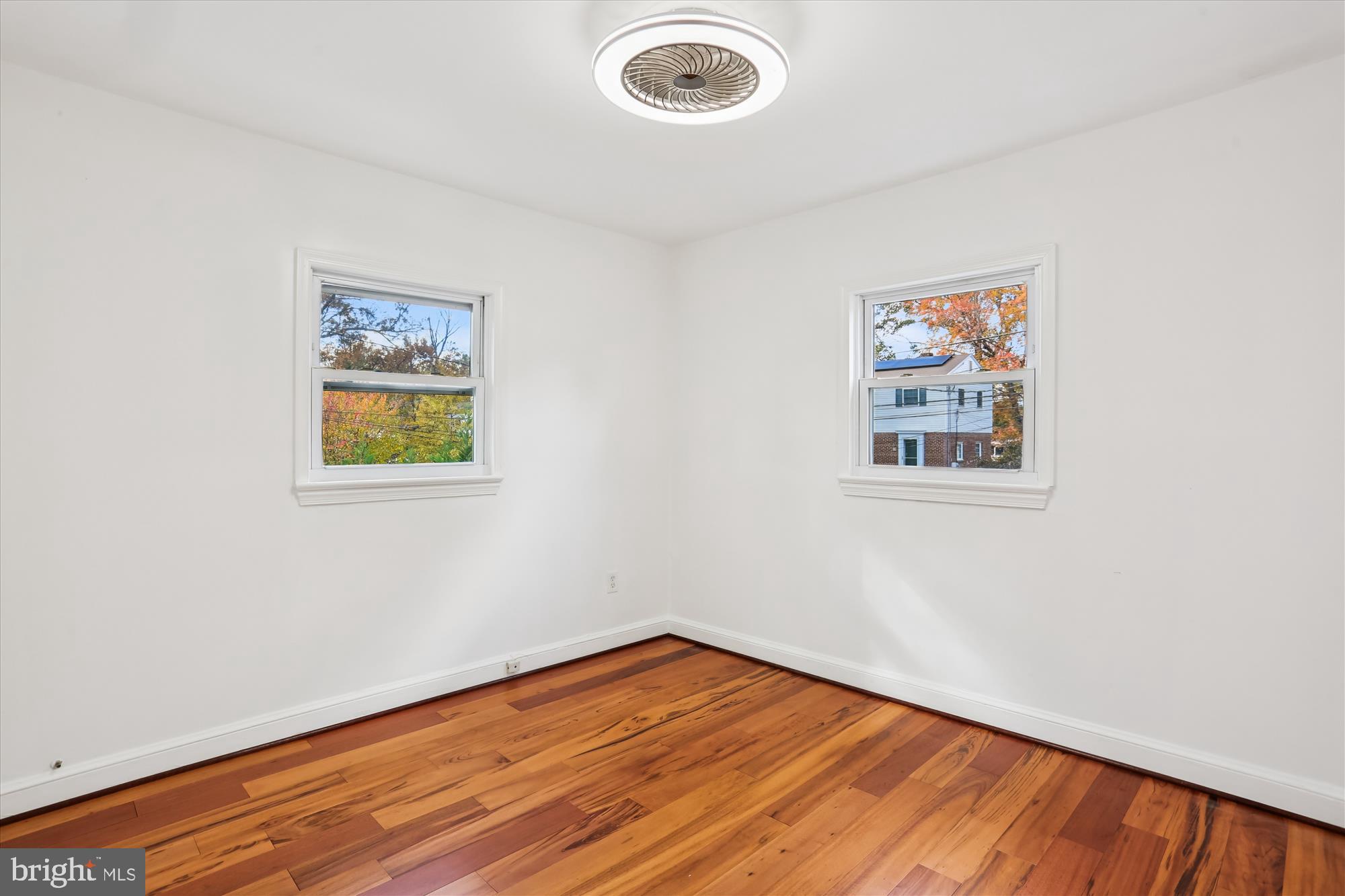717 Ludlow Street Takoma Park, MD 20912 - Photo 34 of 68 a view of empty room with wooden floor