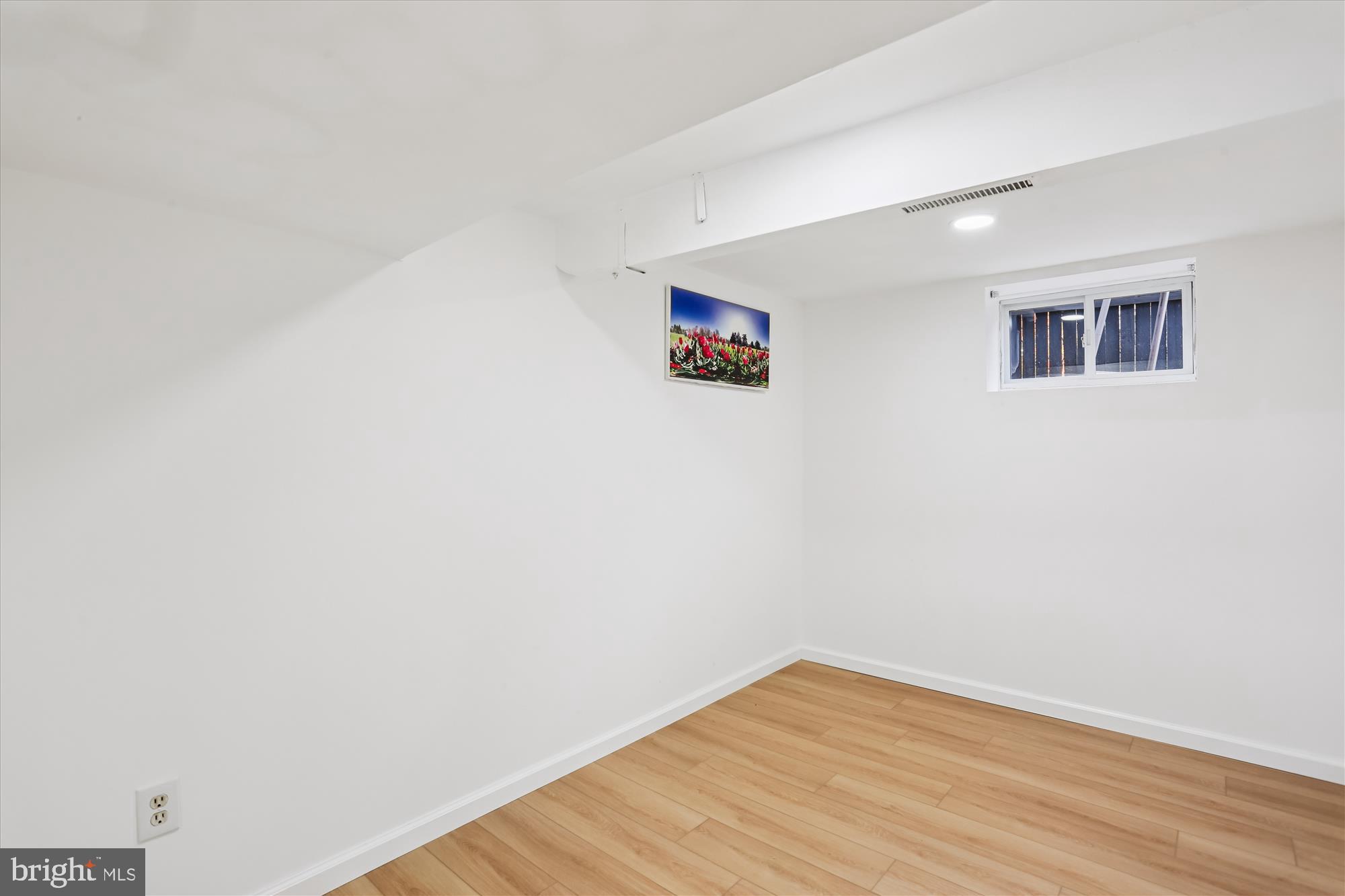 717 Ludlow Street Takoma Park, MD 20912 - Photo 48 of 68 a view of empty room with wooden floor