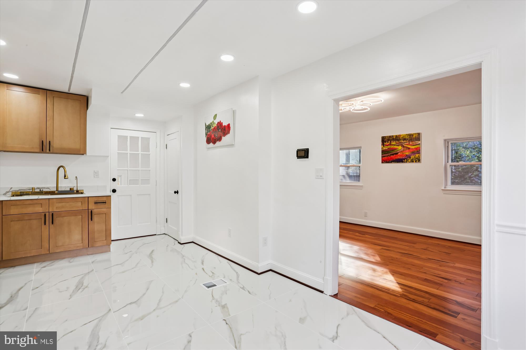 717 Ludlow Street Takoma Park, MD 20912 - Photo 8 of 68 a bathroom with a sink vanity and a mirror