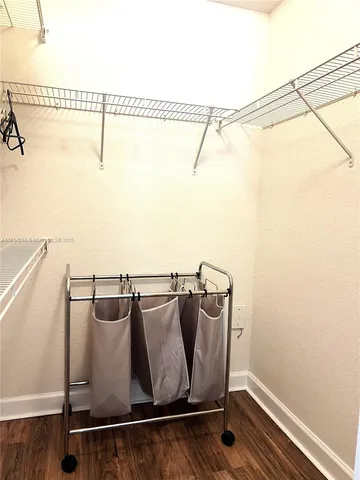 a view of a room with racks on the wall