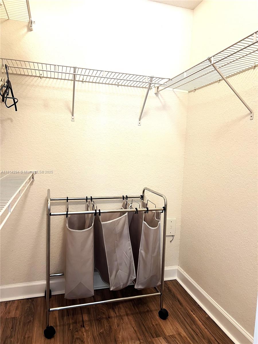 6001 Southwest 70th Street, Unit 252 South Miami, FL 33143 - Photo 15 of 15 a view of a room with racks on the wall