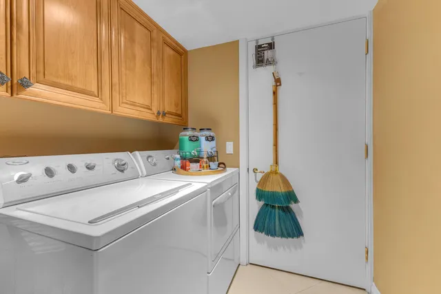 a view of a hallway with wooden floor and entryway