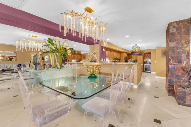 a view of a living room and chandelier