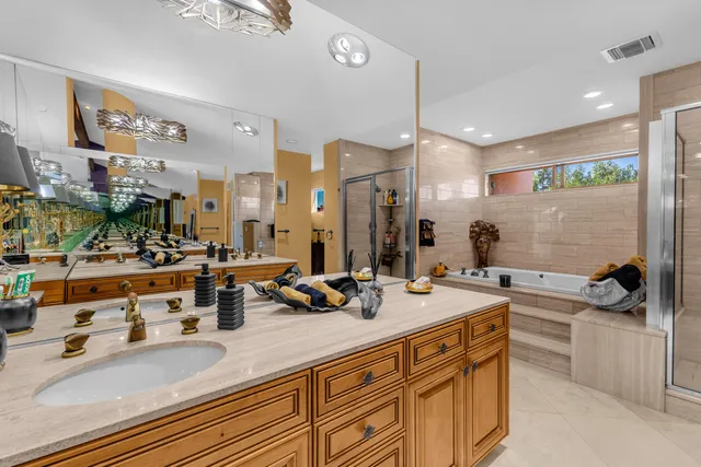 a view of balcony with furniture and umbrella