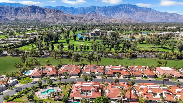 an aerial view of a houses with outdoor space