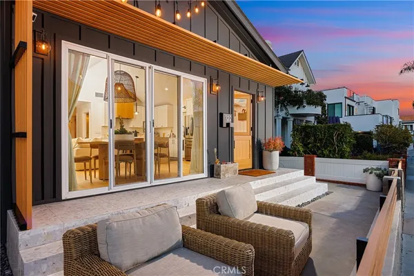 a outdoor space with patio the couch and potted plants