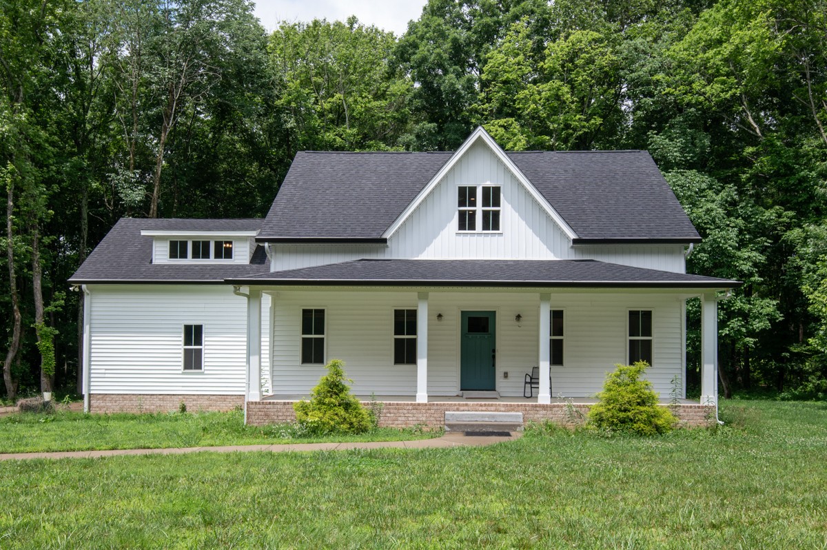 front view of a house with a yard
