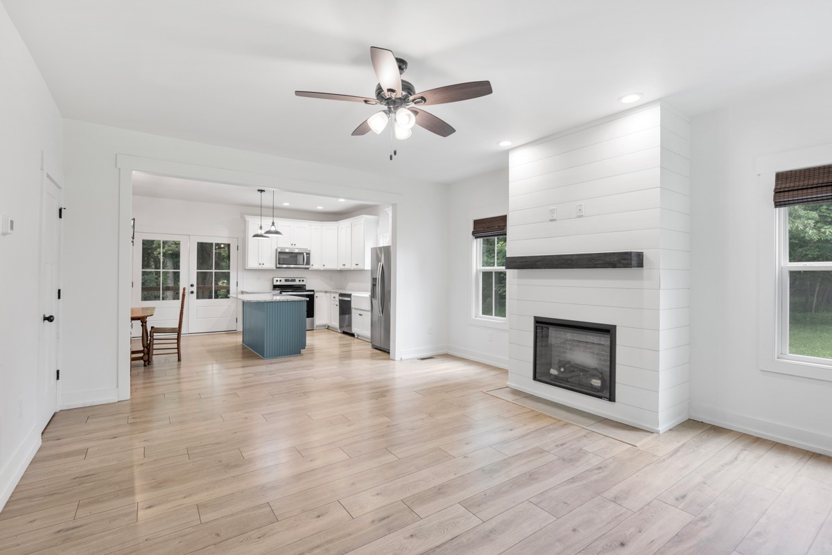 4486 Beards Chapel Road Springfield, TN 37172 - Photo 15 of 54 a living room with furniture and fireplace