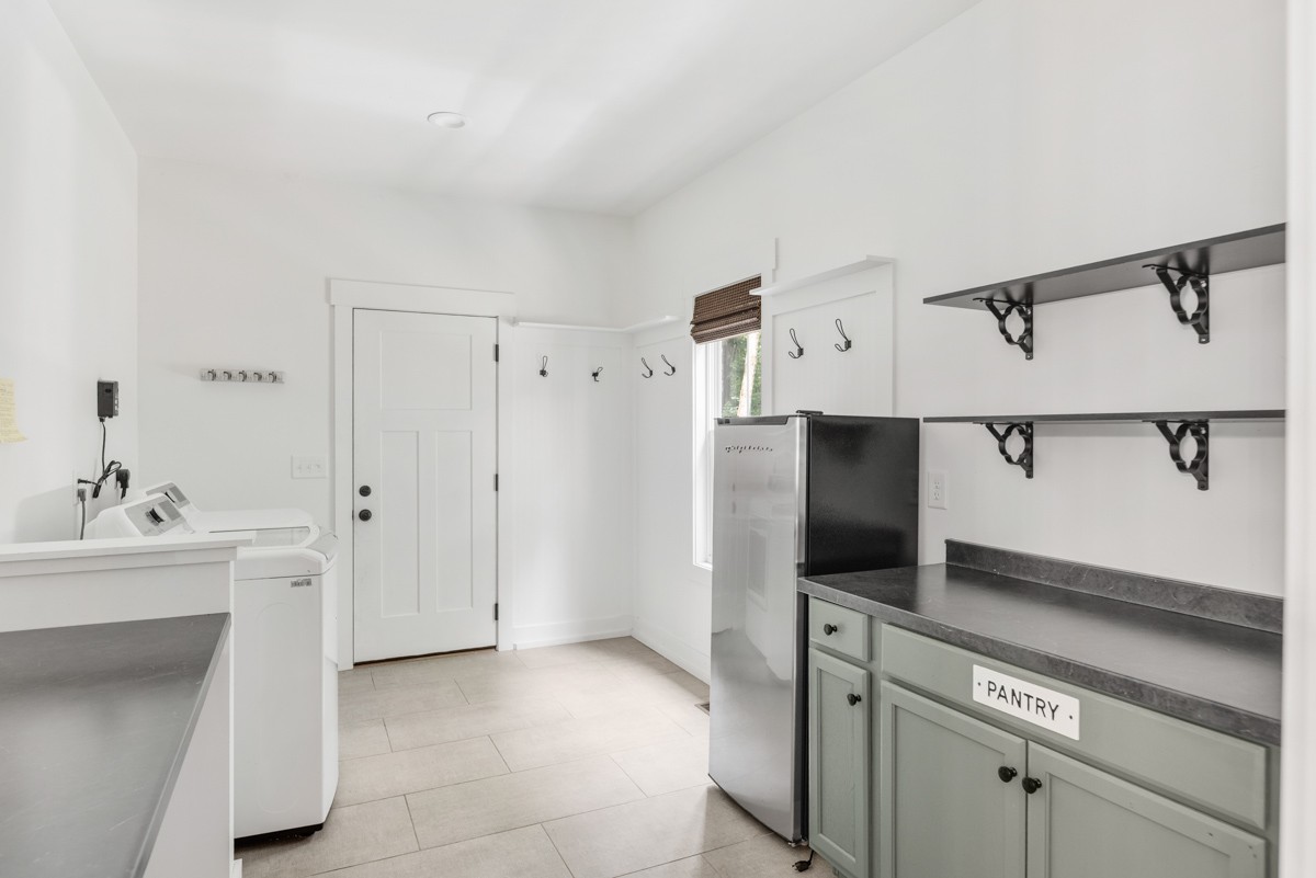 4486 Beards Chapel Road Springfield, TN 37172 - Photo 25 of 54 a kitchen with a refrigerator and a sink