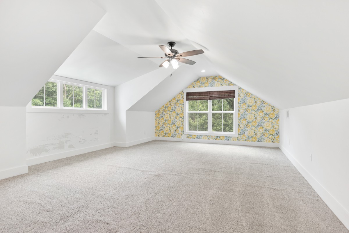 4486 Beards Chapel Road Springfield, TN 37172 - Photo 40 of 54 an empty room with windows and ceiling fan