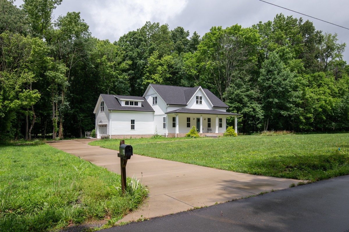 4486 Beards Chapel Road Springfield, TN 37172 - Photo 8 of 54 a front view of a house with a yard
