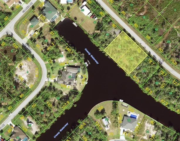 an aerial view of a house with a garden