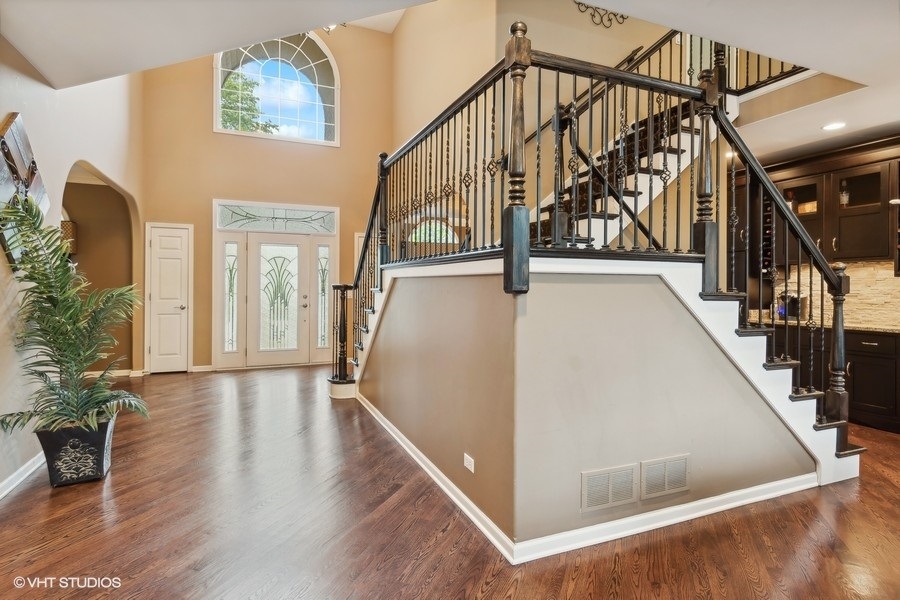 3179 Kingbird Lane Naperville, IL 60564 - Photo 24 of 52 a view of entryway and hall with wooden floor