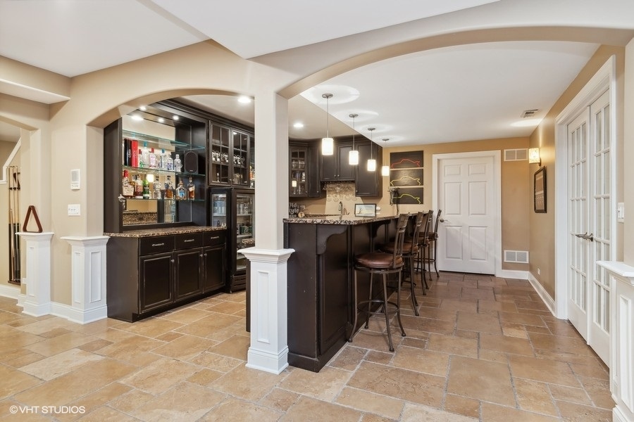3179 Kingbird Lane Naperville, IL 60564 - Photo 45 of 52 a kitchen with a sink cabinets and stainless steel appliances