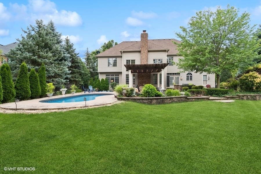 3179 Kingbird Lane Naperville, IL 60564 - Photo 10 of 52 a view of a house with a swimming pool