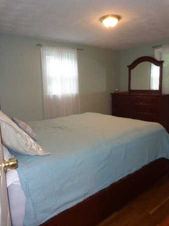 10 Sylvan Road Holbrook, MA 02343 - Photo 11 of 23 a bedroom with a bed and a window