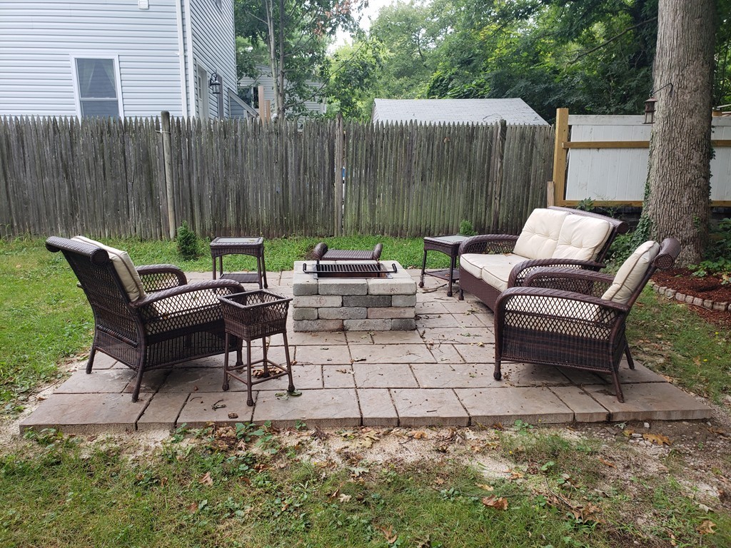 10 Sylvan Road Holbrook, MA 02343 - Photo 20 of 23 a view of a backyard with chairs