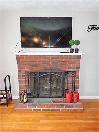 10 Sylvan Road Holbrook, MA 02343 - Photo 3 of 23 a room with furniture and flat screen tv