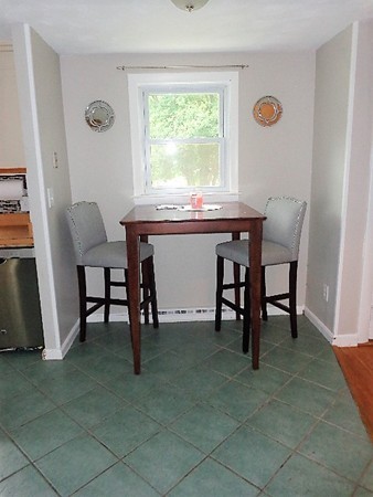 10 Sylvan Road Holbrook, MA 02343 - Photo 7 of 23 a view of a livingroom with furniture and a window