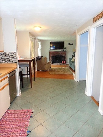 10 Sylvan Road Holbrook, MA 02343 - Photo 8 of 23 a bedroom with furniture and a fireplace