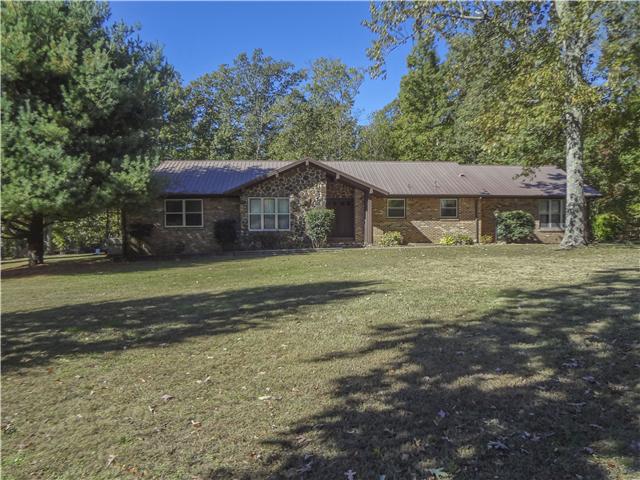 1186 Pleasant Ridge Road Goodspring, TN 38460 - Photo 1 of 20 a front view of a house with a yard