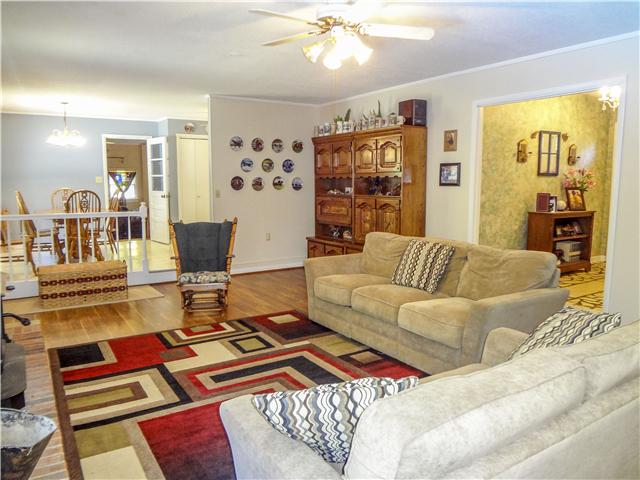 1186 Pleasant Ridge Road Goodspring, TN 38460 - Photo 12 of 20 a living room with furniture and wooden floor