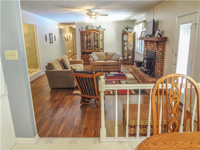 1186 Pleasant Ridge Road Goodspring, TN 38460 - Photo 13 of 20 a living room with furniture fireplace and flat screen tv