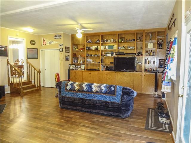 1186 Pleasant Ridge Road Goodspring, TN 38460 - Photo 20 of 20 a living room with furniture and a flat screen tv