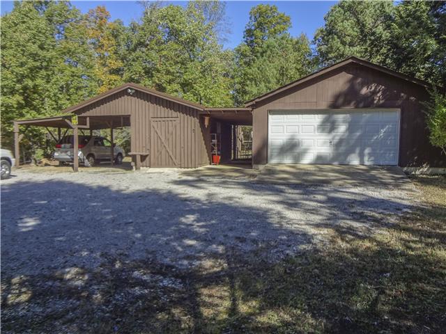 1186 Pleasant Ridge Road Goodspring, TN 38460 - Photo 3 of 20 a house with trees in the background