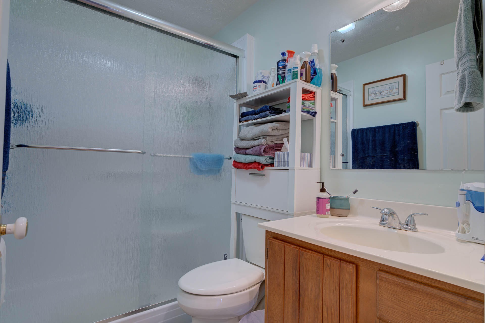 286 Oss Williams Road Limestone, TN 37681 - Photo 24 of 45 a bathroom with a sink vanity mirror and toilet