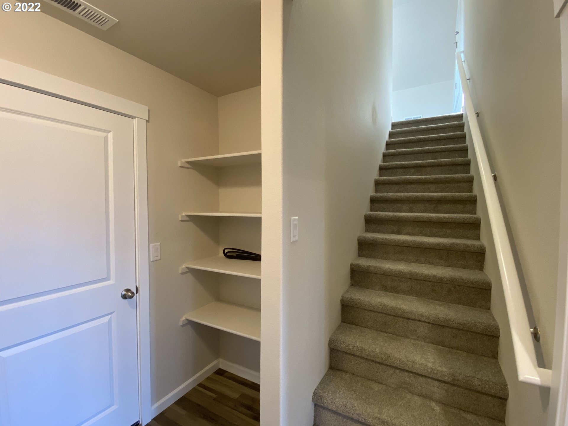 413 Southeast Ray Street, Unit 39 Dallas, OR 97338 - Photo 12 of 15 a view of entryway with wooden floor