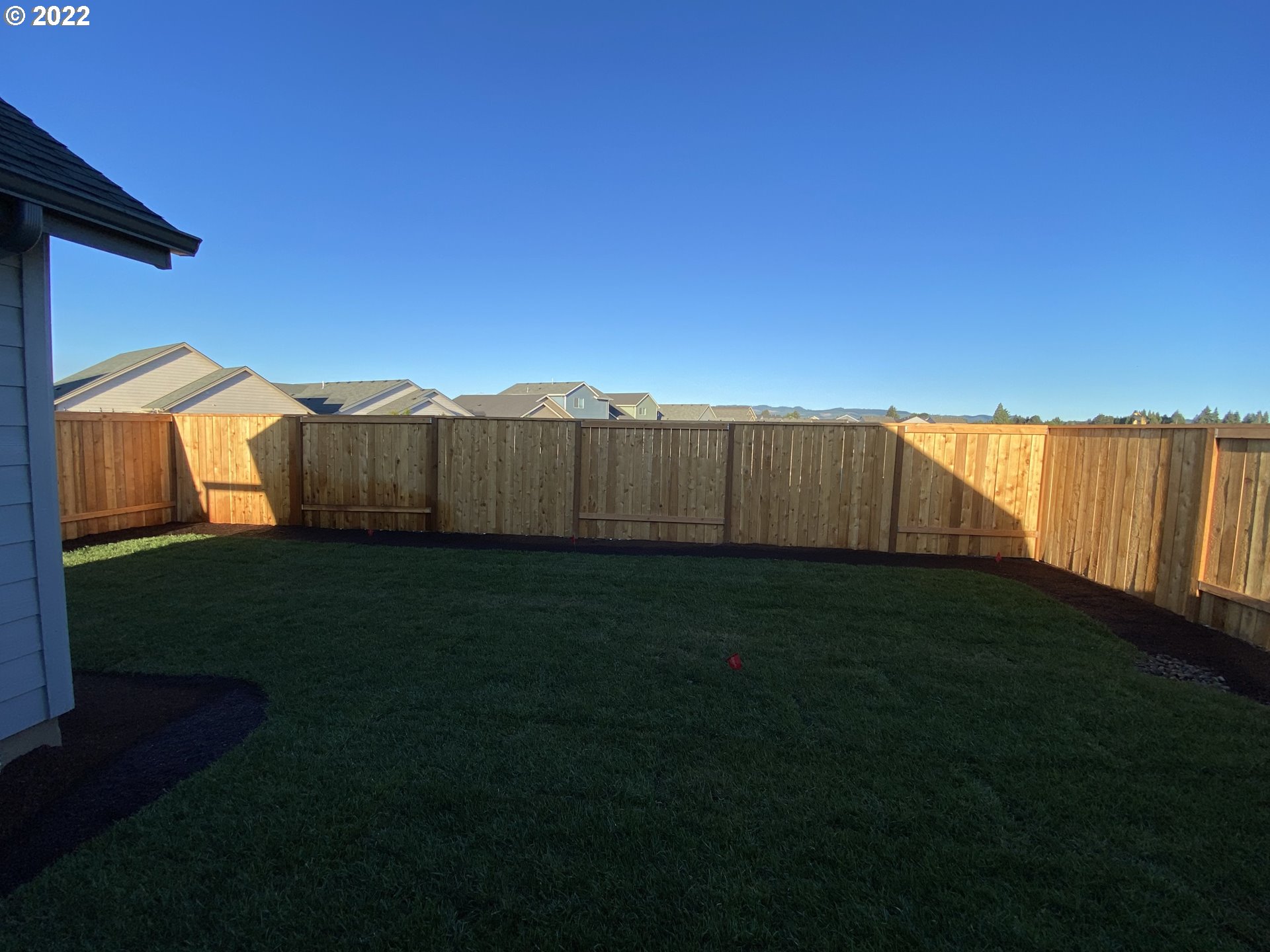 413 Southeast Ray Street, Unit 39 Dallas, OR 97338 - Photo 5 of 15 a view of a backyard with green space