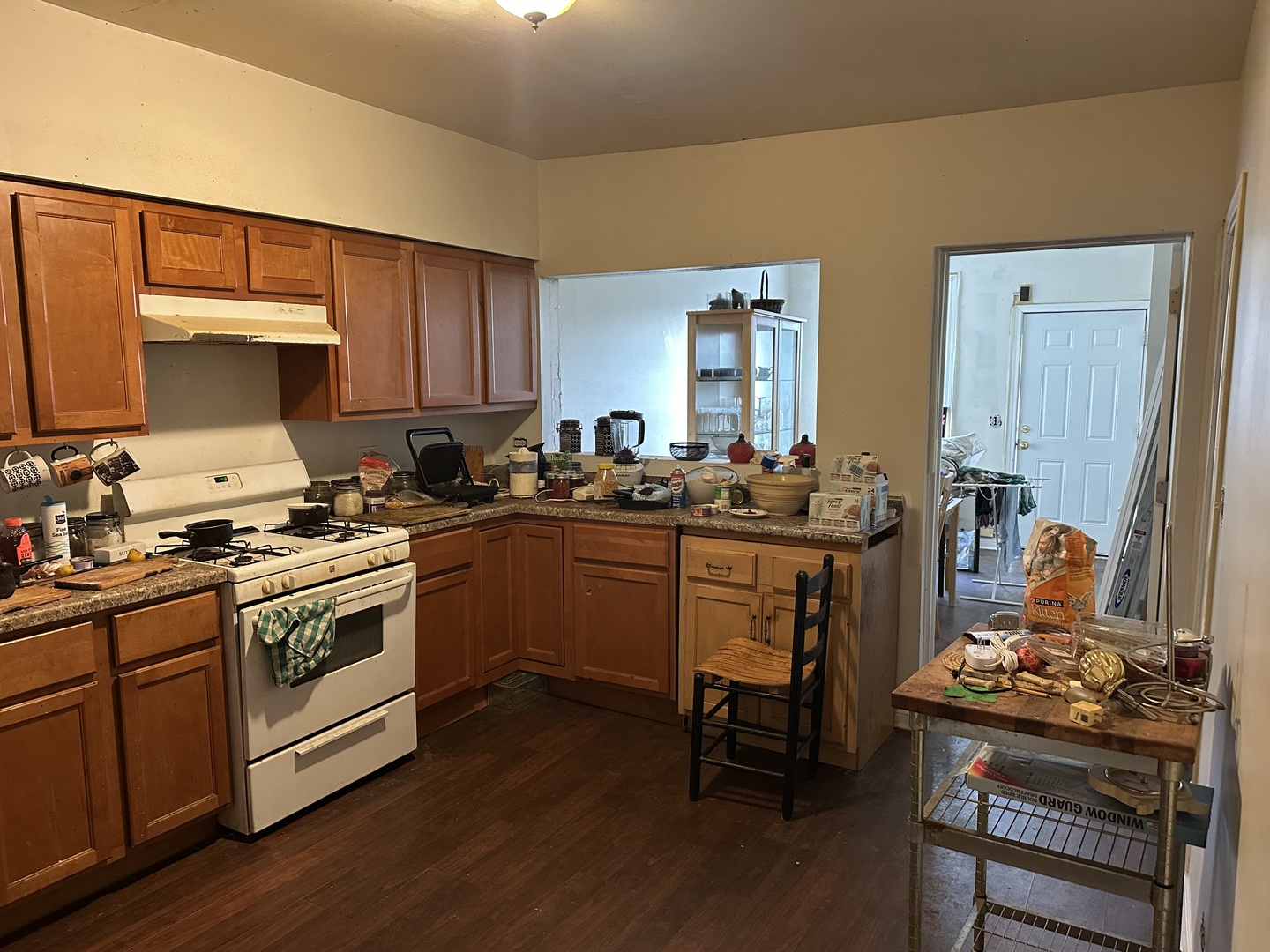 7232 Madison Street Forest Park, IL 60130 - Photo 7 of 9 a kitchen with a sink cabinets and wooden floor