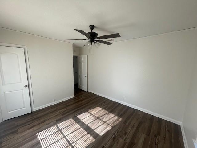 7428 Gaston Avenue Fort Worth, TX 76116 - Photo 17 of 17 a view of room with a ceiling fan and wooden floor