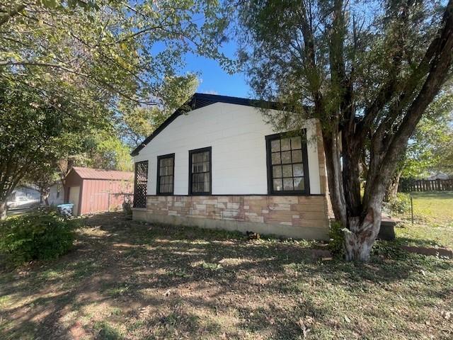 7428 Gaston Avenue Fort Worth, TX 76116 - Photo 2 of 17 a view of house with yard